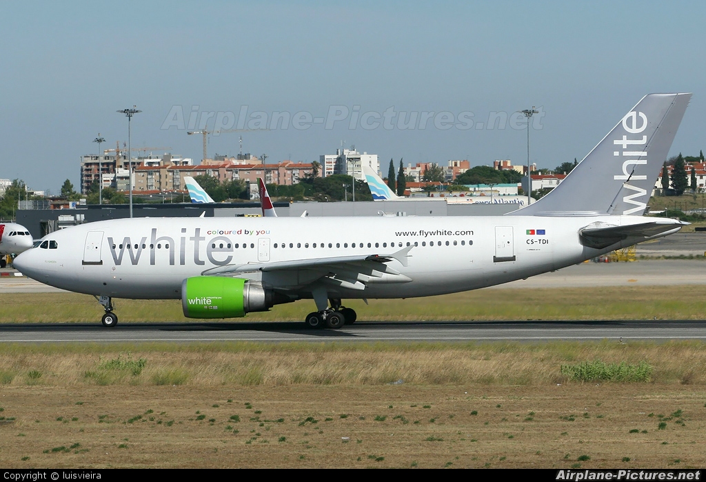 White Airways CS-TDI aircraft at Lisbon