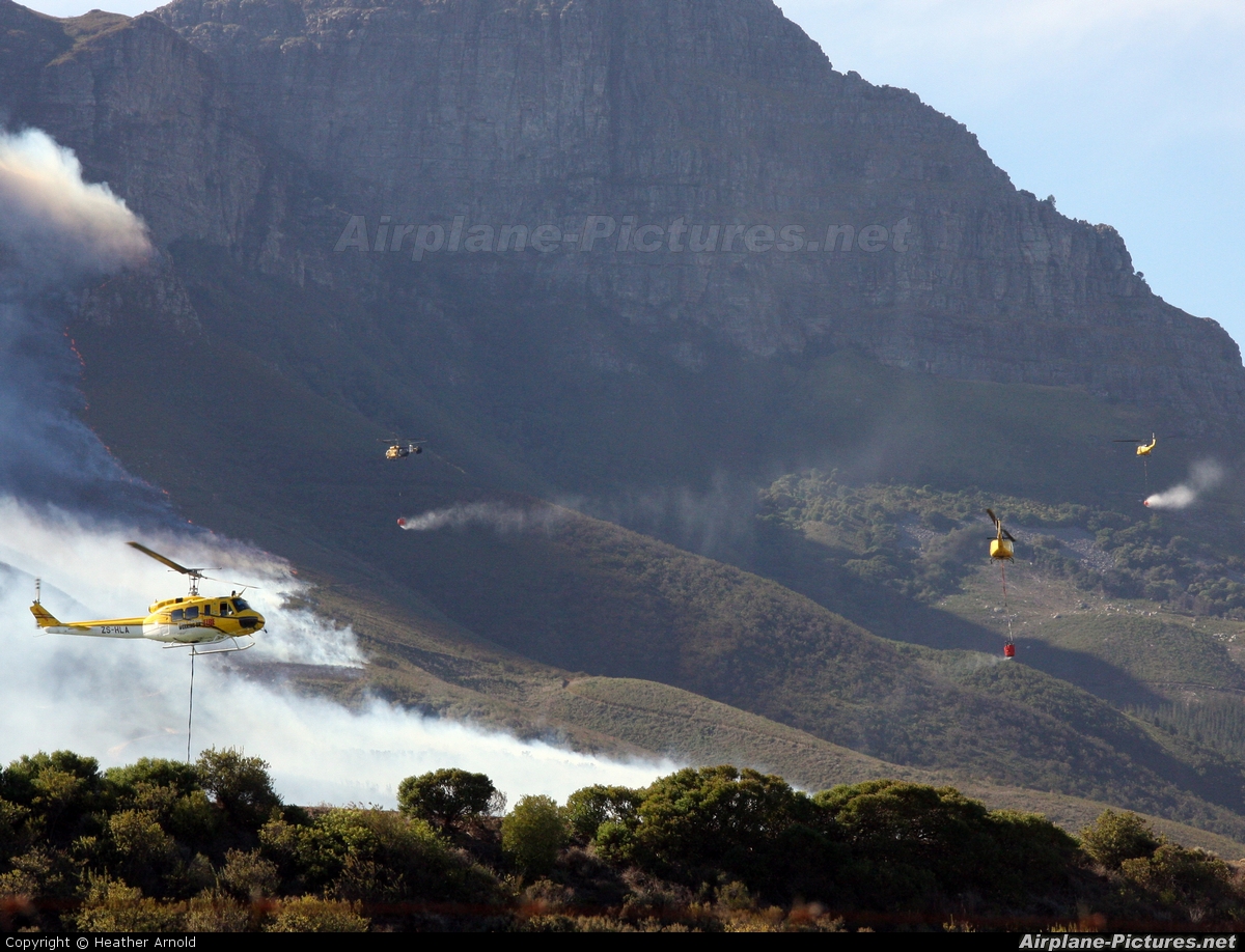 Working on Fire ZS-HLA aircraft at Off Airport - South Africa