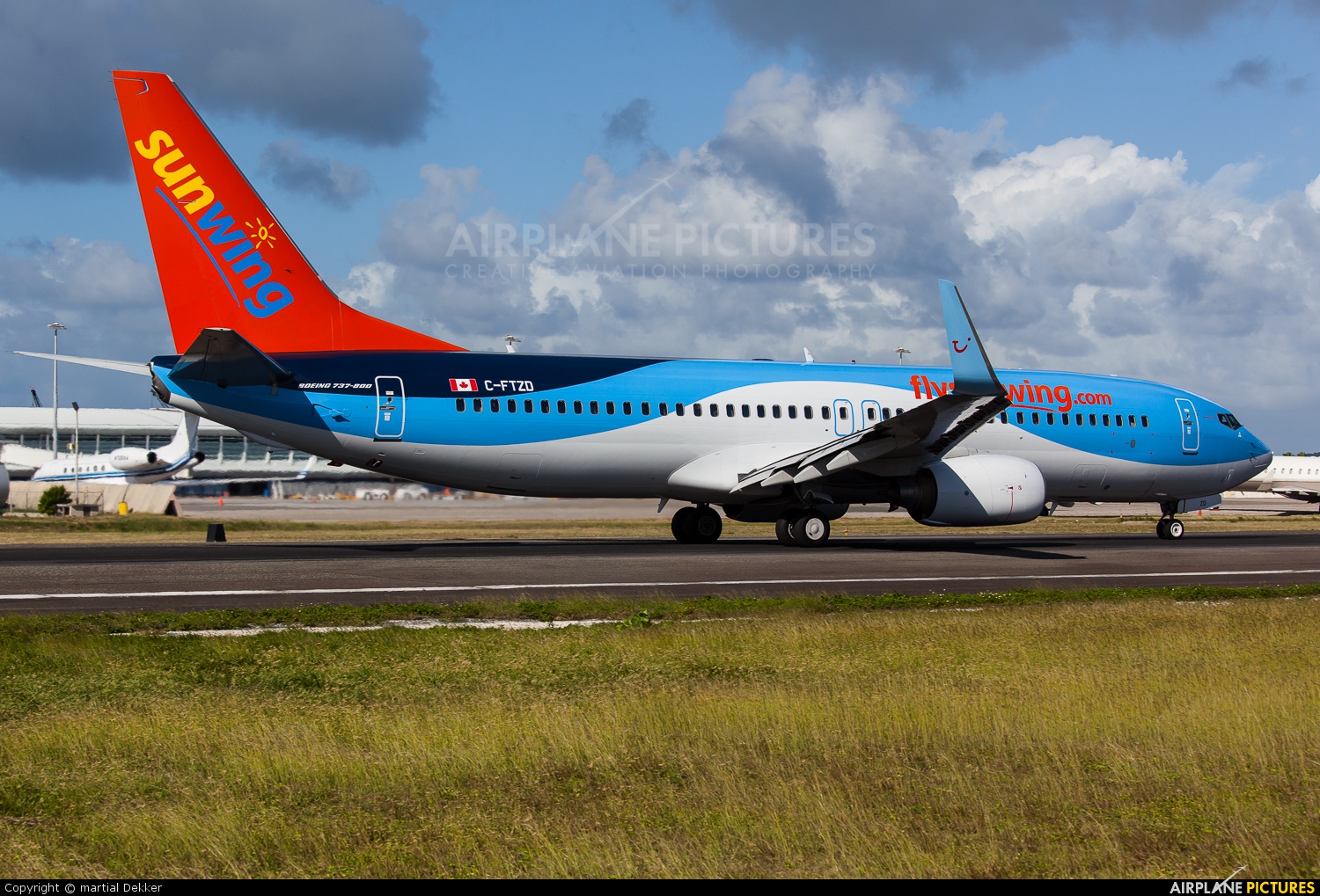 Sunwing Airlines C-FTZD aircraft at Sint Maarten - Princess Juliana Intl