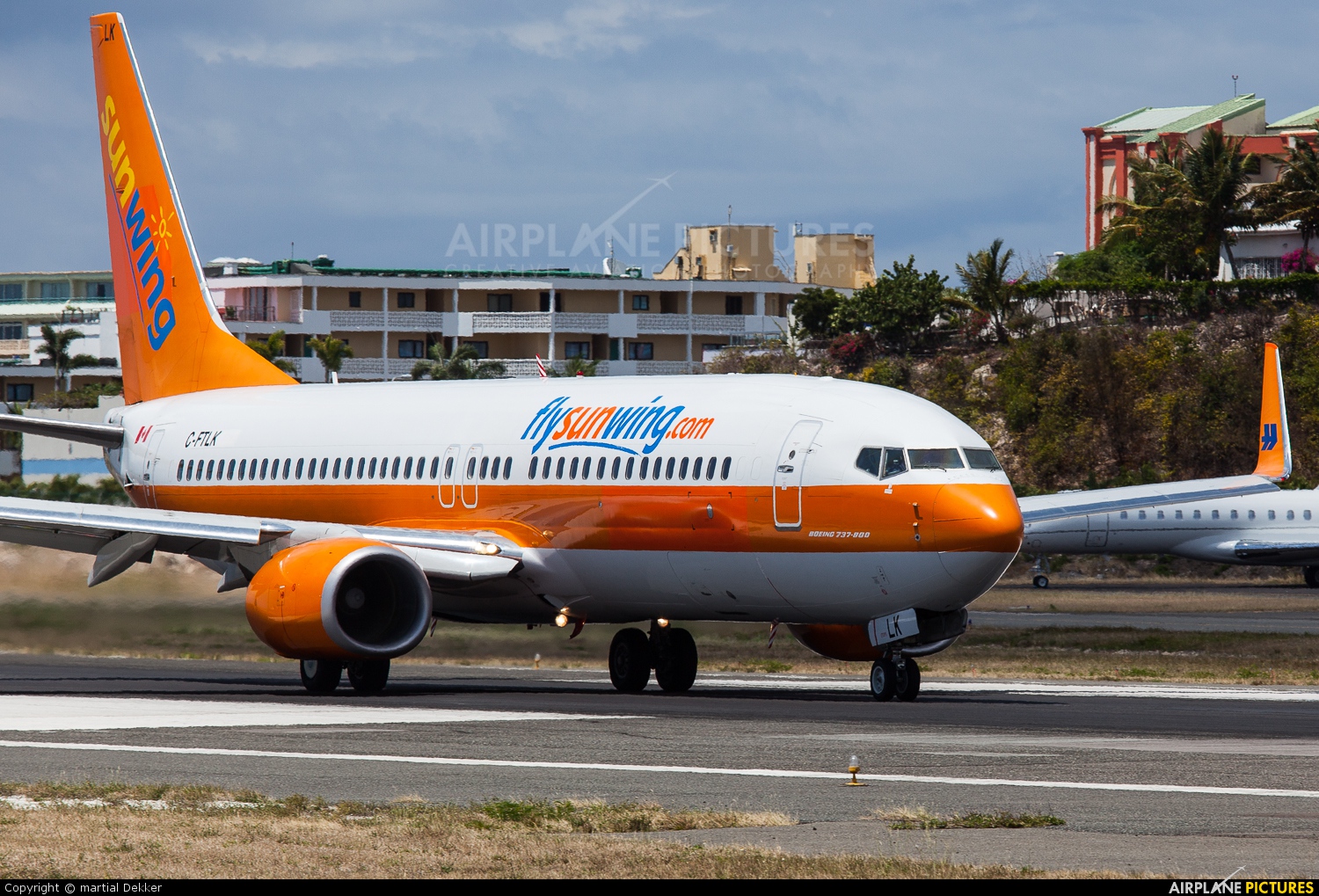 Sunwing Airlines C-FTLK aircraft at Sint Maarten - Princess Juliana Intl