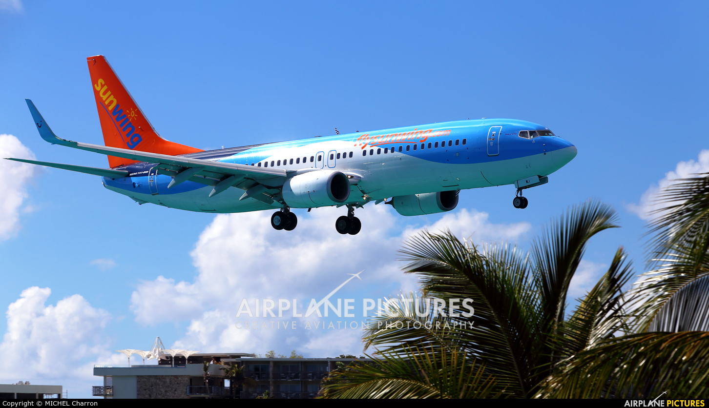 Sunwing Airlines C-GVOJ aircraft at Sint Maarten - Princess Juliana Intl
