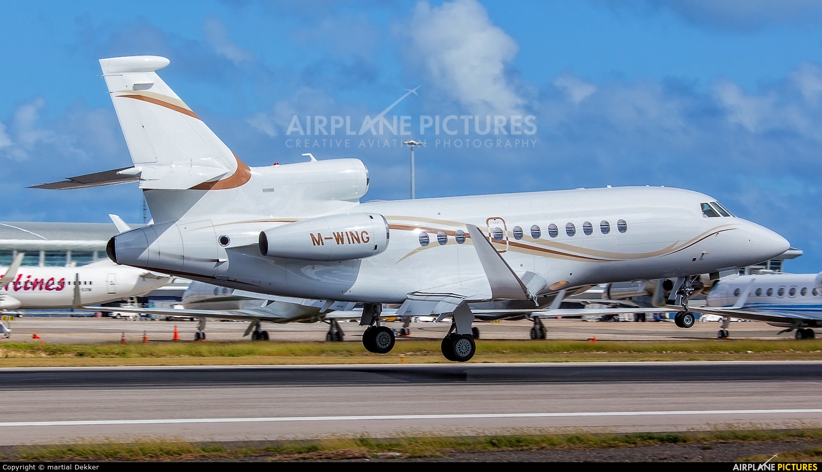 Private M-WING aircraft at Sint Maarten - Princess Juliana Intl
