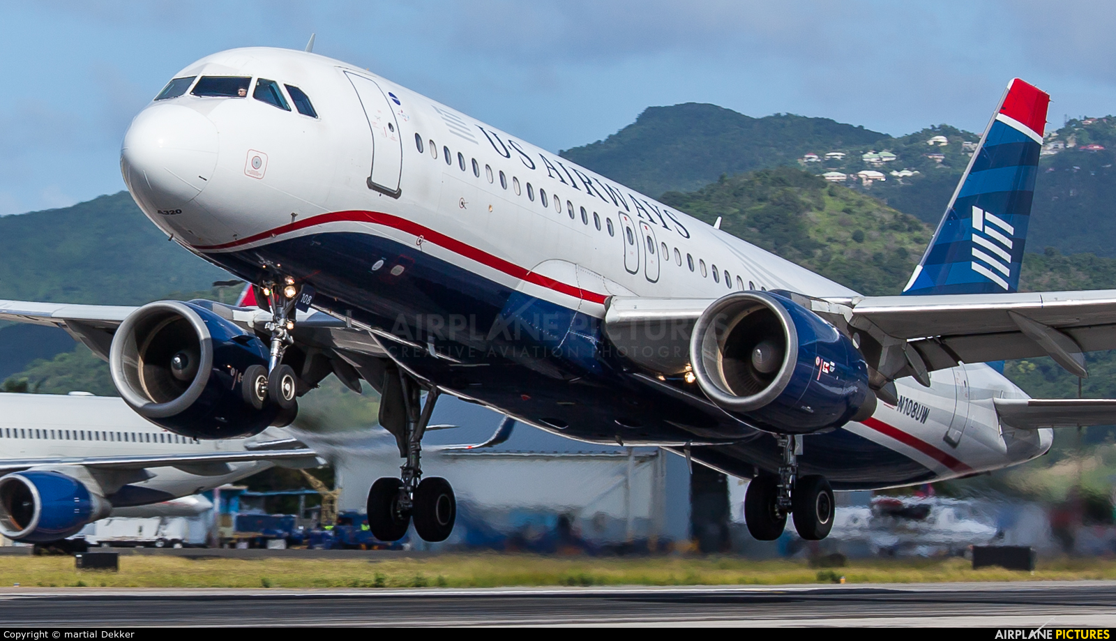 US Airways N108UW aircraft at Sint Maarten - Princess Juliana Intl