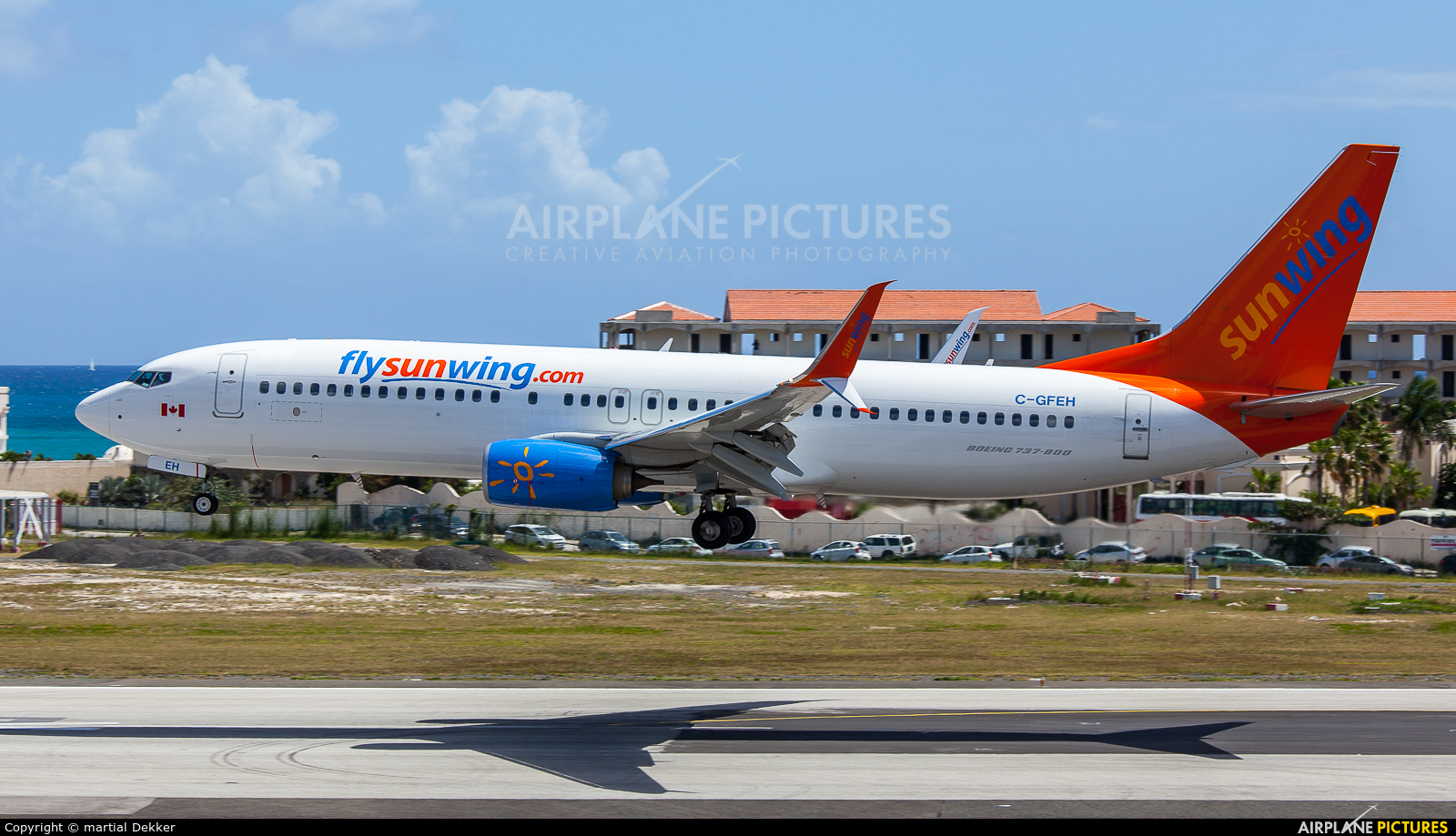 Sunwing Airlines C-GFEH aircraft at Sint Maarten - Princess Juliana Intl