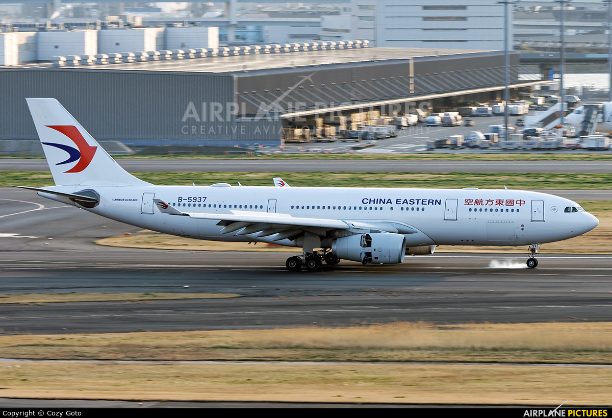 China Eastern Airlines B-5937 aircraft at Tokyo - Haneda Intl