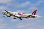 Qatar B777 wears World Cup special livery title=