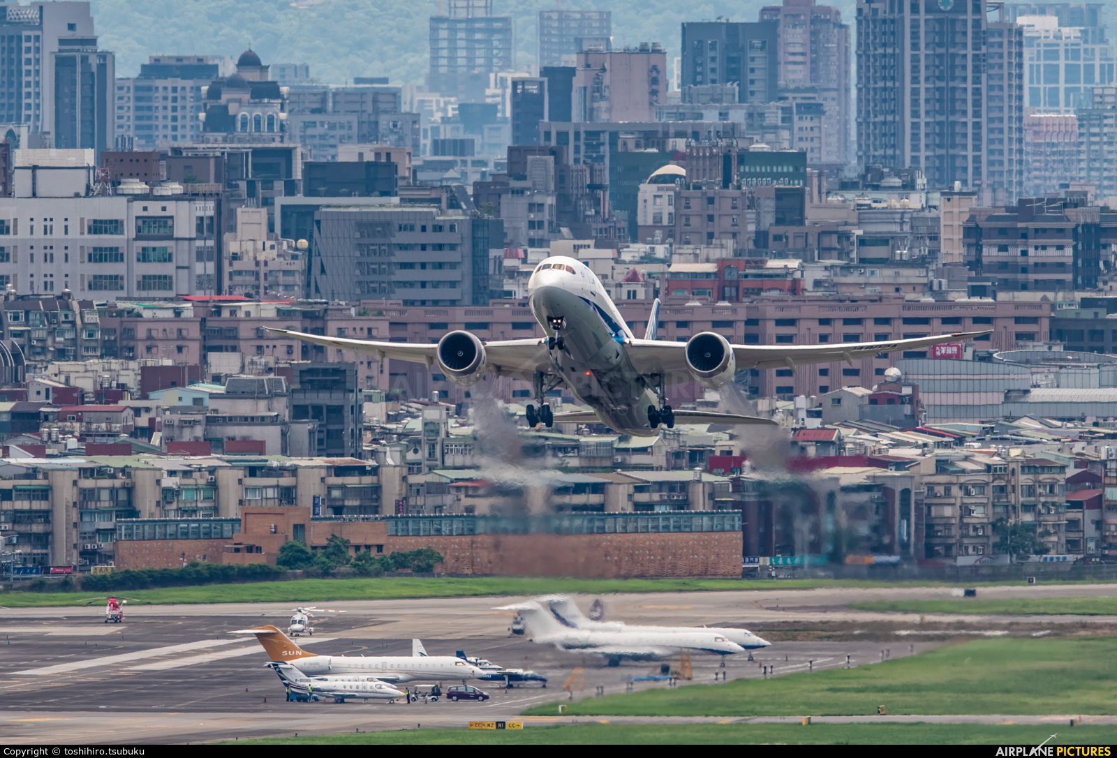 ANA - All Nippon Airways JA802A aircraft at Taipei Sung Shan/Songshan Airport
