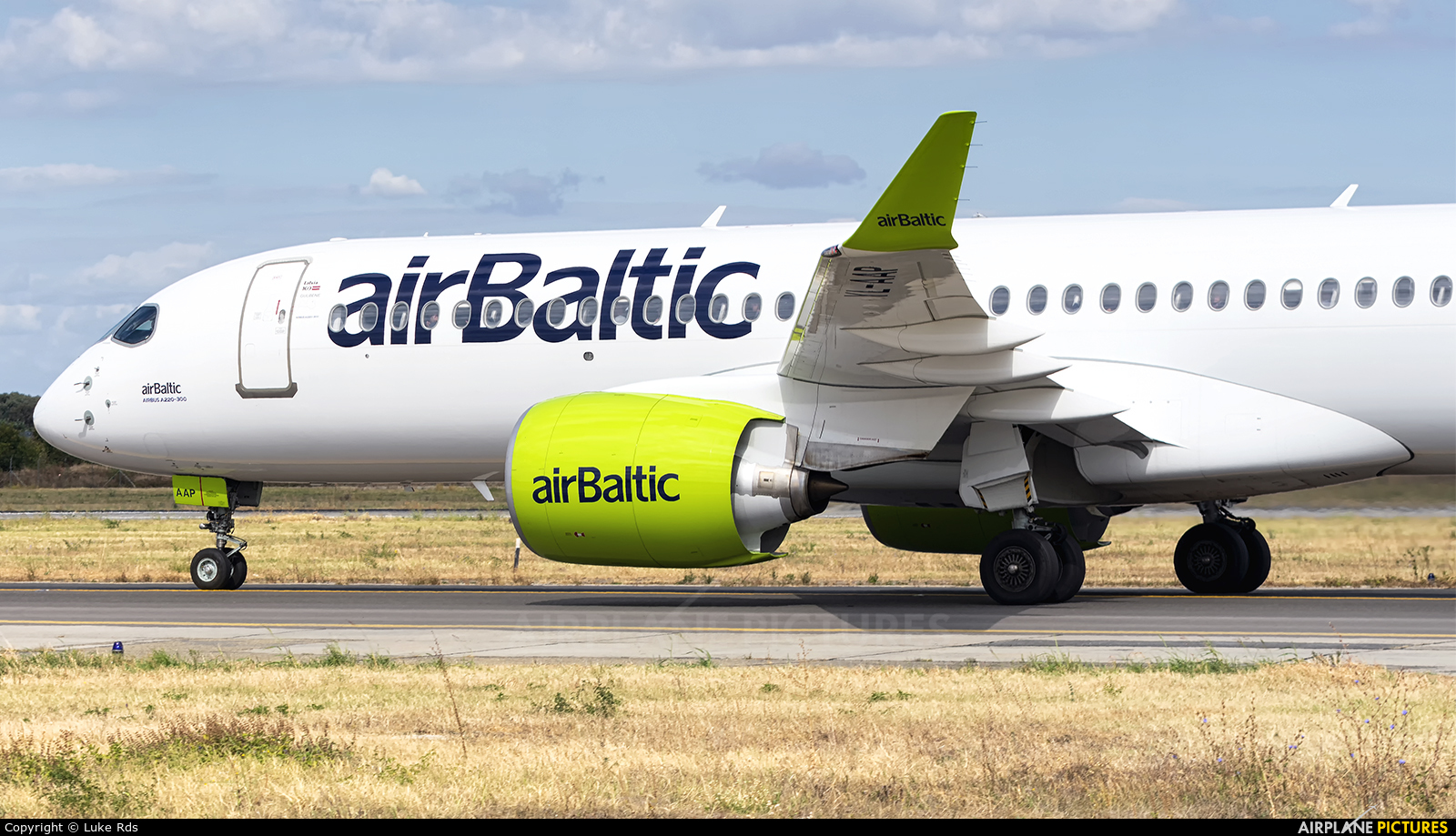 Air Baltic YL-AAP aircraft at Bucharest - Henri Coandă