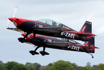 G-ZXCL - 2 Excel Aviation "The Blades Aerobatic Team" Extra 300L, LC, LP series