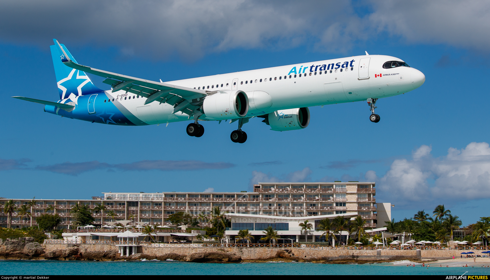 Air Transat C-GOIO aircraft at Sint Maarten - Princess Juliana Intl