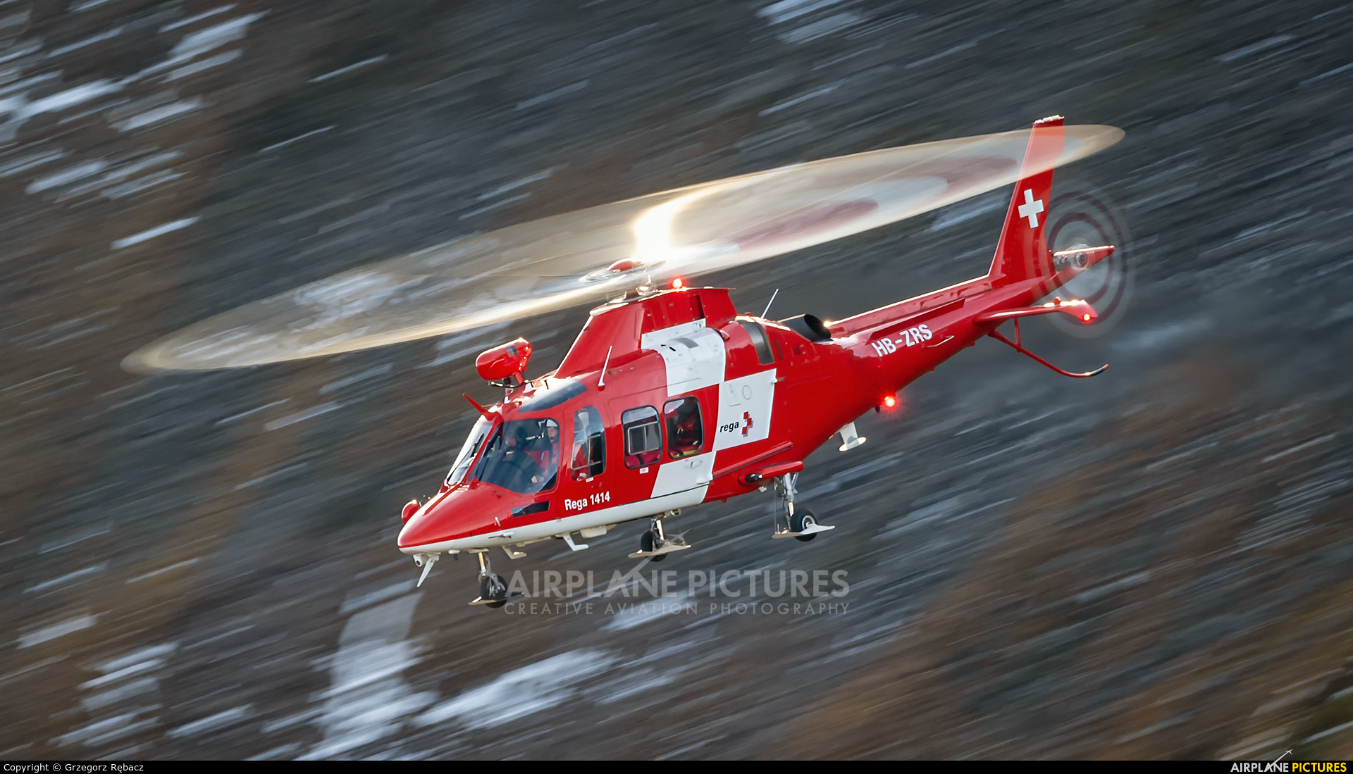 REGA Swiss Air Ambulance  HB-ZRS aircraft at Ebenfluhe Range, Axalp