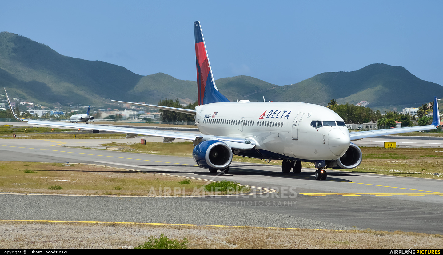 Delta Air Lines N303DQ aircraft at Sint Maarten - Princess Juliana Intl