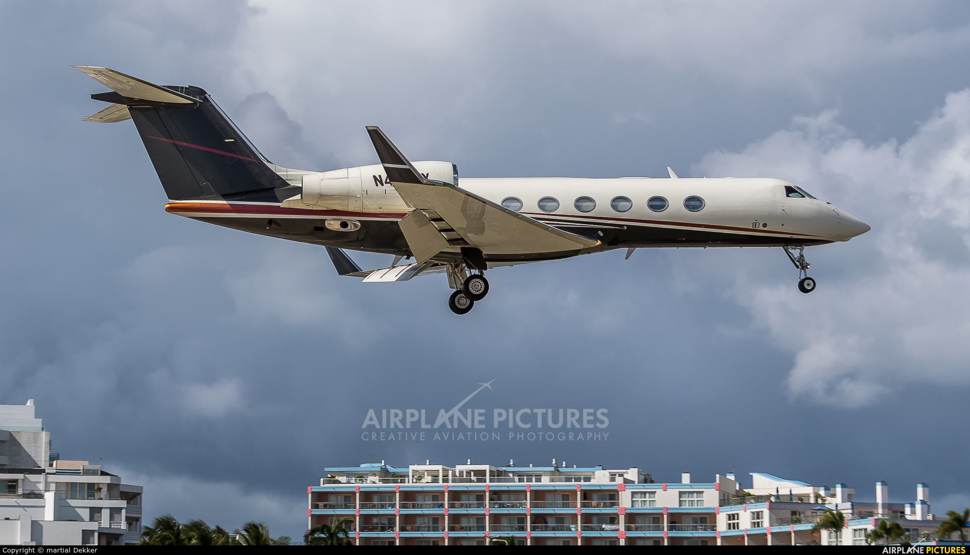 FlexJet N457FX aircraft at Sint Maarten - Princess Juliana Intl