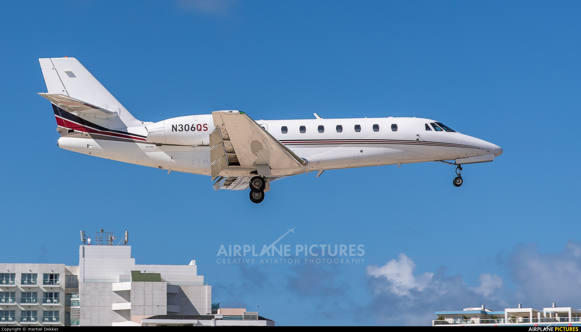 NetJets Aviation N306QS aircraft at Sint Maarten - Princess Juliana Intl